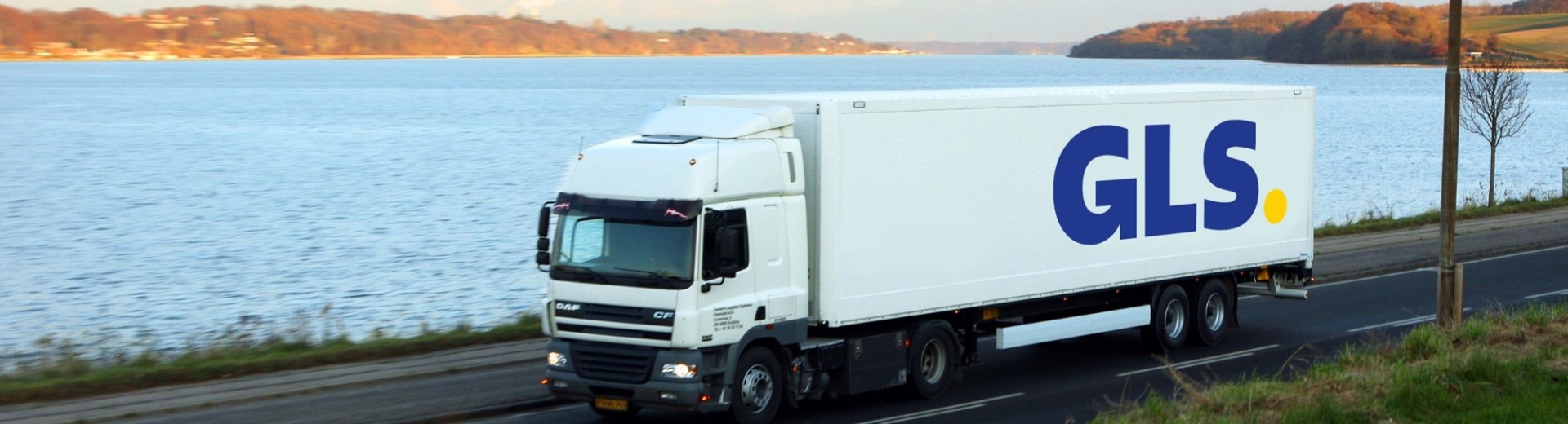 GLS truck draving near water