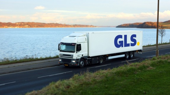 GLS truck draving near water