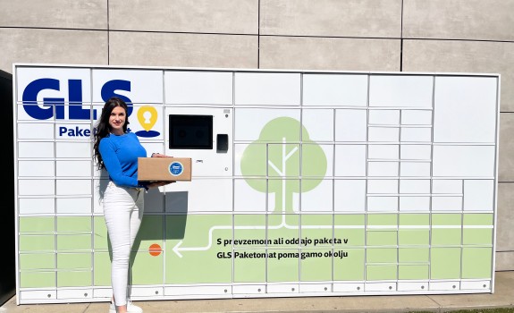 Sustainable GLS Parcel Locker in Slovenia with girl holding a parcel